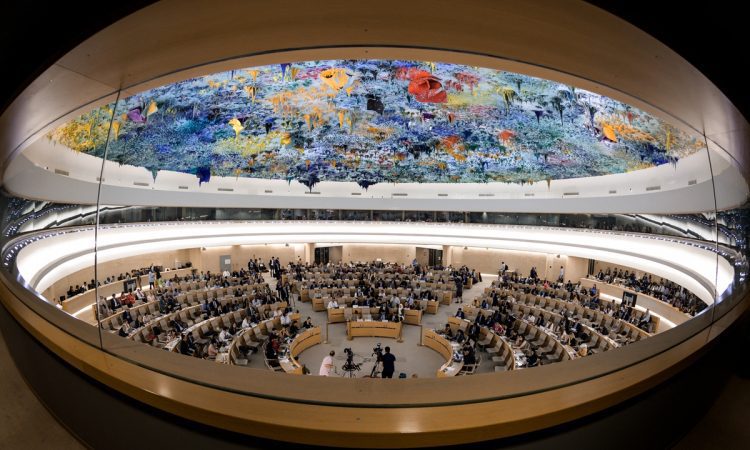 A picture taken on June 26, 2019 shows a general view of the United Nations Human Rights Council room during a debate on the report of (UN) special rapporteur on extrajudicial, summary or arbitrary executions of the killing of Saudi journalist Jamal Khashoggi in Geneva. (Photo by FABRICE COFFRINI / AFP)