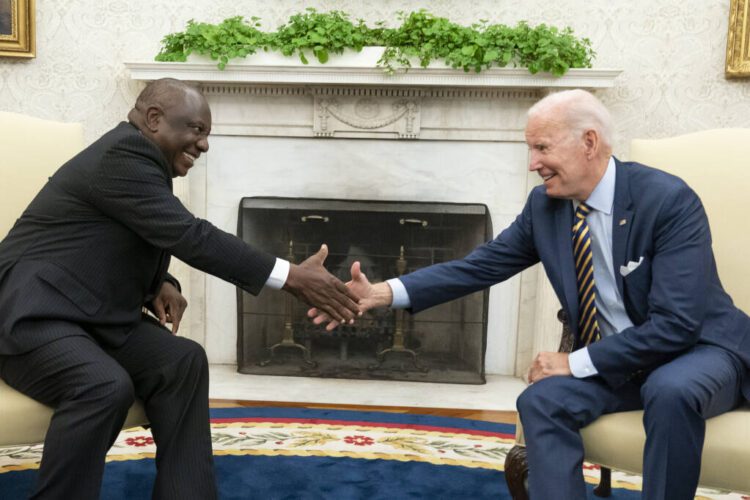 President Joe Biden shakes hands with South African President Cyril Ramaphosa in the Oval Office of the White House, Friday, Sept. 16, 2022, in Washington. (AP Photo/Alex Brandon)