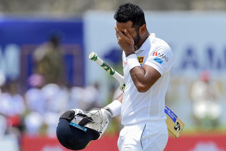 Sri Lanka's cricket captain Dimuth Karunaratne leaves the field after being dismissed during the final day of the opening Test cricket match between Sri Lanka and New Zealand at the Galle International Cricket Stadium in Galle on August 18, 2019. (Photo by ISHARA S. KODIKARA / AFP) (Photo credit should read ISHARA S. KODIKARA/AFP/Getty Images)