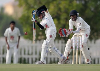 Al Bateen Chargers Siddtharth Capoor in action with Abu Dhabi Indian School wicket keeper Akhilesh Ramesh at the U-15 of the National School League at the Zayed Cricket Stadium in Abu Dhabi, November 14, 2014. Photo by Joseph J Capellan/Sport360