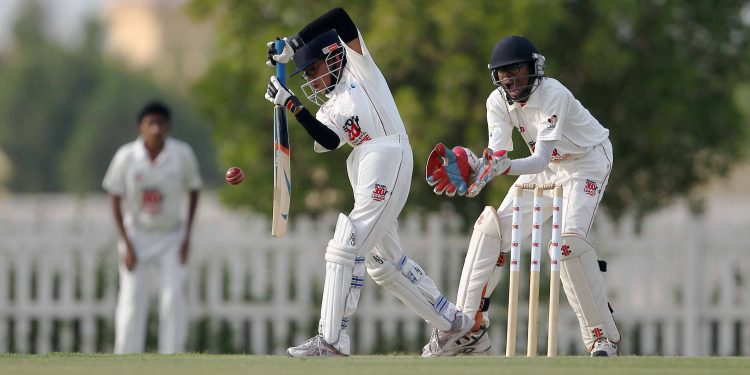 Al Bateen Chargers Siddtharth Capoor in action with Abu Dhabi Indian School wicket keeper Akhilesh Ramesh at the U-15 of the National School League at the Zayed Cricket Stadium in Abu Dhabi, November 14, 2014. Photo by Joseph J Capellan/Sport360