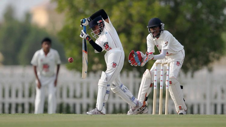 Al Bateen Chargers Siddtharth Capoor in action with Abu Dhabi Indian School wicket keeper Akhilesh Ramesh at the U-15 of the National School League at the Zayed Cricket Stadium in Abu Dhabi, November 14, 2014. Photo by Joseph J Capellan/Sport360