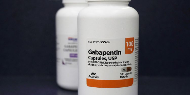 This Thursday, May 3, 2018 photo shows bottles of gabapentin at Daniel's Pharmacy in San Francisco. The 25-year-old  non-opioid pain drug is one of the most prescribed medications in the U.S., ranking ninth over 2017, according to prescription tracker GoodRx. Researchers attribute the recent surge to tighter restrictions on opioids, which have left doctors searching for alternatives for their patients. (AP Photo/Jeff Chiu)