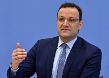 German Health Minister Jens Spahn speaks during a press conference with the head of the Robert Koch Institute for disease control on the situation in Germany amid the new coronavirus pandemic on April 17, 2020 in Berlin. (Photo by John MACDOUGALL / various sources / AFP)