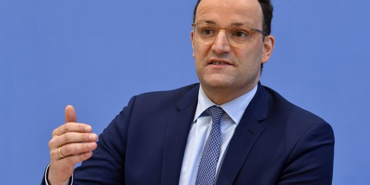 German Health Minister Jens Spahn speaks during a press conference with the head of the Robert Koch Institute for disease control on the situation in Germany amid the new coronavirus pandemic on April 17, 2020 in Berlin. (Photo by John MACDOUGALL / various sources / AFP)