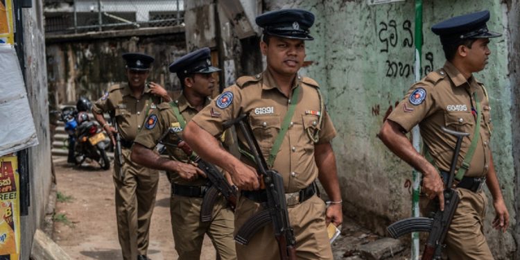 COLOMBO, SRI LANKA - APRIL 26: Police officers patrol the area around Dawatagaha Jumma Masjid ahead of Friday prayers on April 26, 2019 in Colombo, Sri Lanka. The Sri Lankan Health Ministry revised the death toll from the deadly terror attacks on Easter Sunday to 253 after coordinated attacks on three churches and three luxury hotels in the Colombo area and eastern city of Batticaloa, injuring hundreds. Based on reports, six foreign police agencies and Interpol, including Scotland Yard from the UK and the FBI from the US, are currently assisting local police as the Islamic State group claimed responsibility for the attacks although there has been no public evidence of direct involvement. (Photo by Carl Court/Getty Images)
