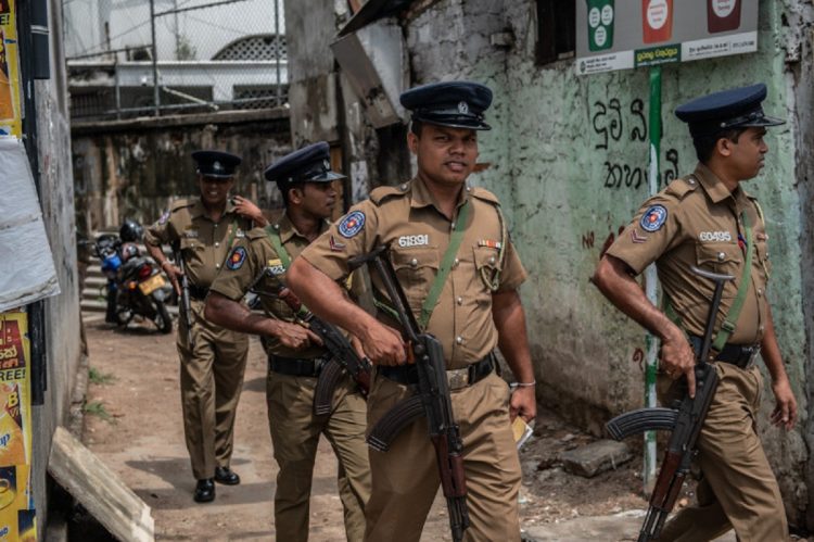 COLOMBO, SRI LANKA - APRIL 26: Police officers patrol the area around Dawatagaha Jumma Masjid ahead of Friday prayers on April 26, 2019 in Colombo, Sri Lanka. The Sri Lankan Health Ministry revised the death toll from the deadly terror attacks on Easter Sunday to 253 after coordinated attacks on three churches and three luxury hotels in the Colombo area and eastern city of Batticaloa, injuring hundreds. Based on reports, six foreign police agencies and Interpol, including Scotland Yard from the UK and the FBI from the US, are currently assisting local police as the Islamic State group claimed responsibility for the attacks although there has been no public evidence of direct involvement. (Photo by Carl Court/Getty Images)