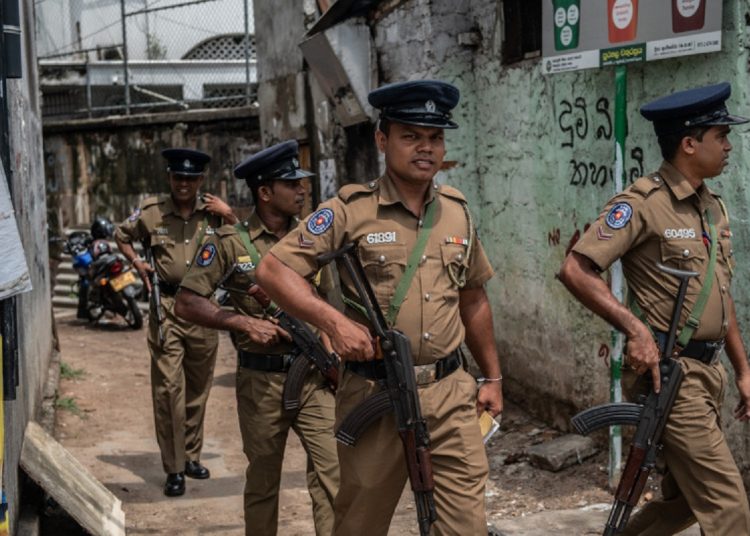 COLOMBO, SRI LANKA - APRIL 26: Police officers patrol the area around Dawatagaha Jumma Masjid ahead of Friday prayers on April 26, 2019 in Colombo, Sri Lanka. The Sri Lankan Health Ministry revised the death toll from the deadly terror attacks on Easter Sunday to 253 after coordinated attacks on three churches and three luxury hotels in the Colombo area and eastern city of Batticaloa, injuring hundreds. Based on reports, six foreign police agencies and Interpol, including Scotland Yard from the UK and the FBI from the US, are currently assisting local police as the Islamic State group claimed responsibility for the attacks although there has been no public evidence of direct involvement. (Photo by Carl Court/Getty Images)