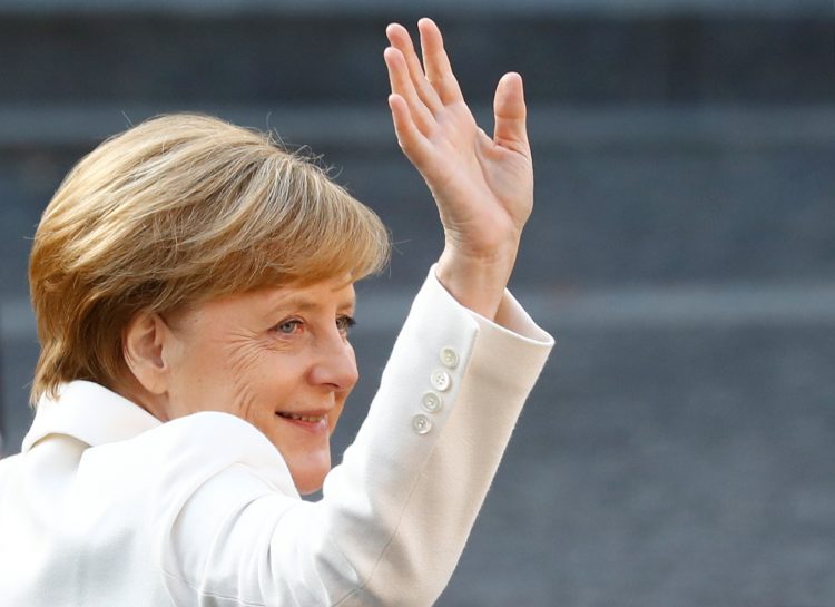 German Chancellor Angela Merkel waves during German Unification Day celebrations in Mainz, Germany, October 3, 2017.   REUTERS/Kai Pfaffenbach