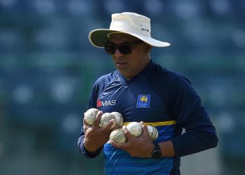 Sri Lanka's newly-appointed head cricket coach Chandika Hathurusingha carries equipment during a practice session at the R. Premadasa Stadium in Colombo on December 28, 2017.
Sri Lanka are scheduled to take part in a tri-nation, one-day international series in January against Zimbabwe and Bangladesh in Dhaka. / AFP PHOTO / ISHARA S. KODIKARA        (Photo credit should read ISHARA S. KODIKARA/AFP/Getty Images)