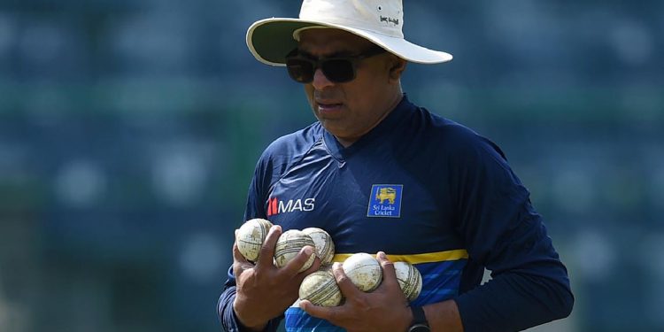 Sri Lanka's newly-appointed head cricket coach Chandika Hathurusingha carries equipment during a practice session at the R. Premadasa Stadium in Colombo on December 28, 2017.
Sri Lanka are scheduled to take part in a tri-nation, one-day international series in January against Zimbabwe and Bangladesh in Dhaka. / AFP PHOTO / ISHARA S. KODIKARA        (Photo credit should read ISHARA S. KODIKARA/AFP/Getty Images)