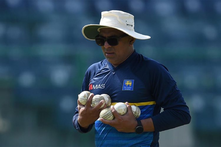Sri Lanka's newly-appointed head cricket coach Chandika Hathurusingha carries equipment during a practice session at the R. Premadasa Stadium in Colombo on December 28, 2017.
Sri Lanka are scheduled to take part in a tri-nation, one-day international series in January against Zimbabwe and Bangladesh in Dhaka. / AFP PHOTO / ISHARA S. KODIKARA        (Photo credit should read ISHARA S. KODIKARA/AFP/Getty Images)