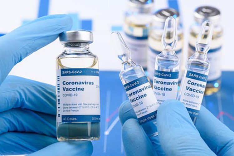 Coronavirus COVID-19 single dose small vials and multi dose in scientist hands concept. Research for new novel corona virus immunization drug.