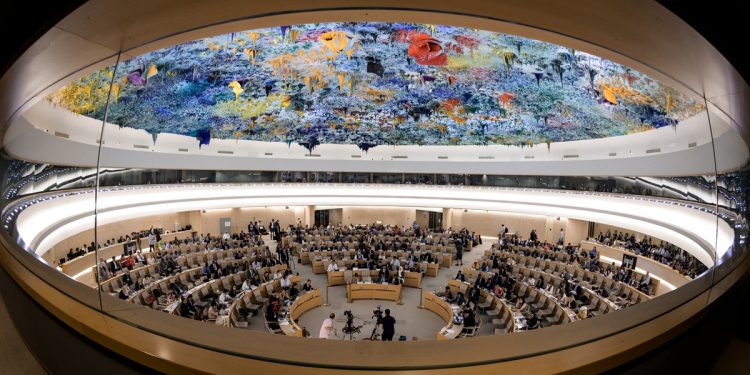 A picture taken on June 26, 2019 shows a general view of the United Nations Human Rights Council room during a debate on the report of (UN) special rapporteur on extrajudicial, summary or arbitrary executions of the killing of Saudi journalist Jamal Khashoggi in Geneva. (Photo by FABRICE COFFRINI / AFP)