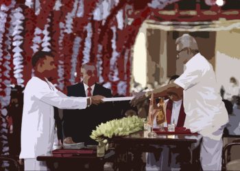 Kandy: Sri Lankan President Gotabaya Rajapaksa, right, hands over credentials to Namal Rajapaksa, elder son of prime minister Mahinda Rajapaksa after appointing him as the country's sports minister during a ceremony in Kandy, Sri Lanka, Wednesday, Aug. 12, 2020. Sri Lanka's president swore into office a new Cabinet on Wednesday that includes two of his elder brothers and a nephew, after a landslide election victory last week. AP/PTI(AP12-08-2020_000079A)