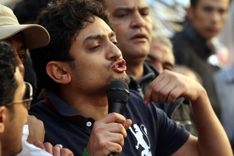 CAIRO, EGYPT - FEBRUARY 08:  Google marketing executive Wael Ghonim greets thousands of anti-government protesters in Tahrir Square on February 8, 2011 in Cairo, Egypt. Ghonim was released by police yesterday after nearly two weeks in custody. He has acknowledged that he was the anonymous administrator of the Facebook page that sparked the protests in Egypt. Thousands of demonstrators continue to occupy the square, demanding the resignation of President Hosni Mubarak.  (Photo by John Moore/Getty Images) *** Local Caption *** Wael Ghonim