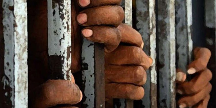 prison-jail-hands-bar