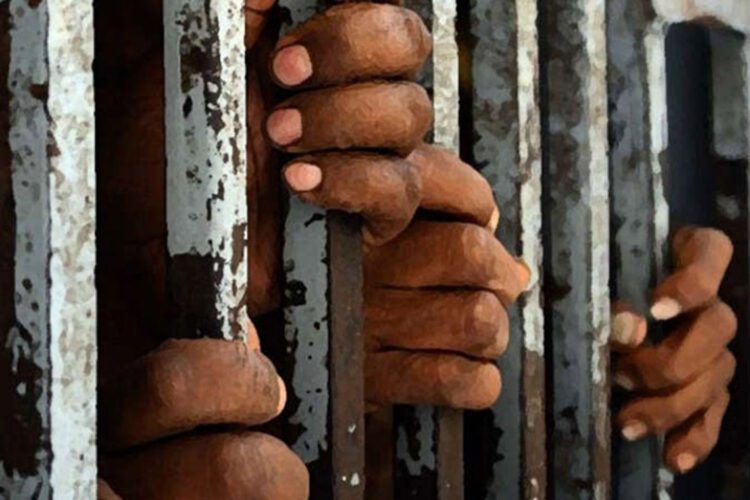 prison-jail-hands-bar