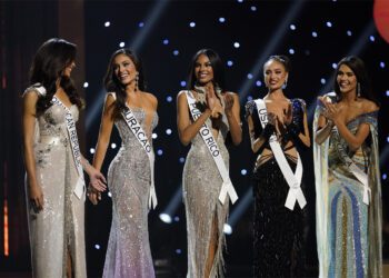 The final five contestants are announced during the final round of the 71st Miss Universe Beauty Pageant in New Orleans, Saturday, Jan. 14, 2023. Left to right are Miss Dominican Republic Andreina Martinez, Miss Curacao Gabriela Dos Santos, Miss Puerto Rico Ashley Carino, Miss USA R'Bonney Gabriel and Miss Venezuela Amanda Dudamel. (AP Photo/Gerald Herbert)