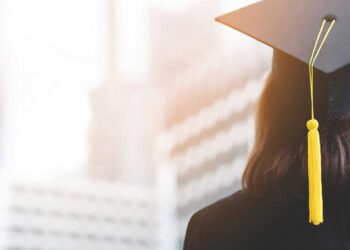 Rear view of a college graduate girl