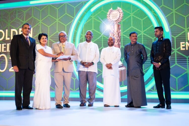Chairman of Prime Health Herbal Products (PHHP) Senior Prof. R. V. P. J. Rajapakse receiving the award