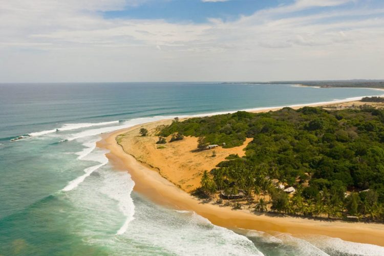 Tropical landscape with a beautiful beach top view. Baby Surf Point, Arugam Bay, Sri Lanka.