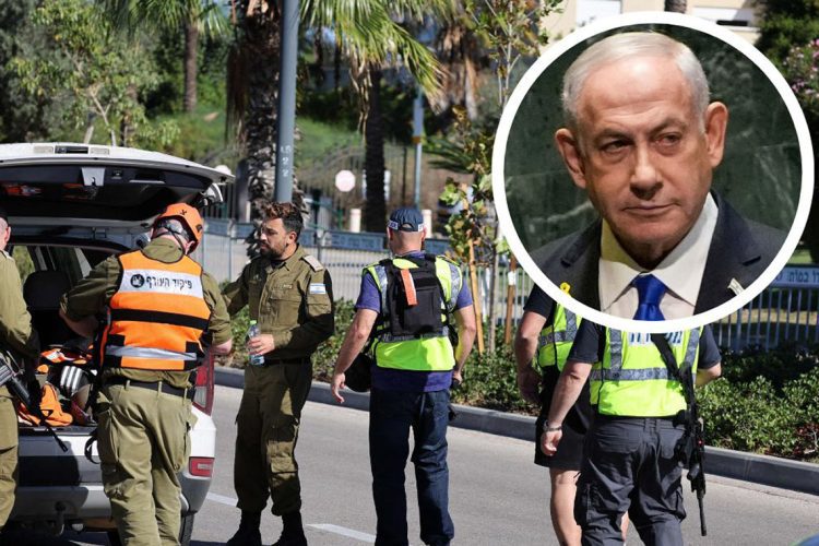 Members of the Israeli security forces walk along a street leading to Prime Minister Benjamin Netanyahu's residence in Caesarea on October 19, 2024 | AFP, AP