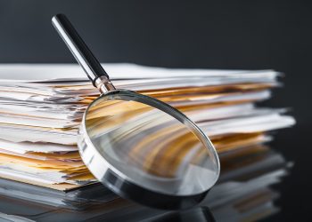 File Stack and Magnifying Glass
