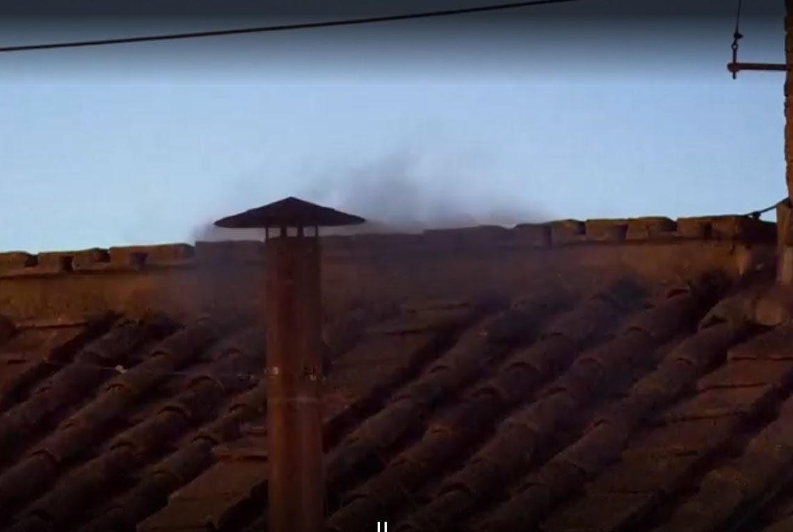 Black-smoke-billowing-from-the-chimney-of-the-Sistine-Chapel